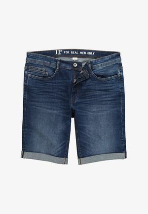 Denim shorts med en mørkeblå vask, rullede kanter og kontrastsyninger. Har fem lommer og en lynlåsgylp med knaplukning.