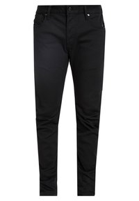 Svarta slim-fit byxor i bomull, med knappstängning, fem fickor och minimal sömnad för en ren design.