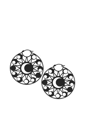 Black metal hoop earrings featuring a circular design with moon and star patterns, intricate cutouts, and alternating solid and open shapes.