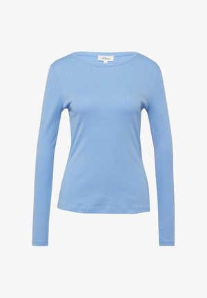 Jasnoniebieska koszula z długim rękawem, z okrągłym dekoltem, wąska w kroju, z małą metką marki wewnątrz kołnierza.