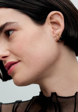 DOUBLE HUGGIE - Earrings - gold plated