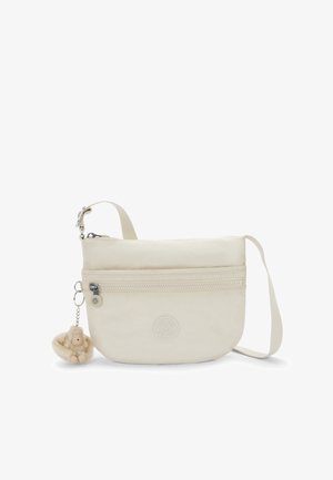 Borsa a tracolla beige realizzata in tessuto morbido, con una tasca con zip e logo. Presenta un portachiavi a forma di scimmia in peluche attaccato alla zip.