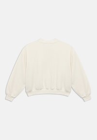 Off-white cropped sweatshirt with long sleeves, ribbed cuffs, and a ribbed hem laid flat showing the back side.