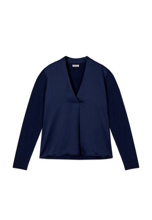 Navy blue long-sleeve blouse with V-neck and smooth front panel, featuring a slightly loose fit and straight hem.