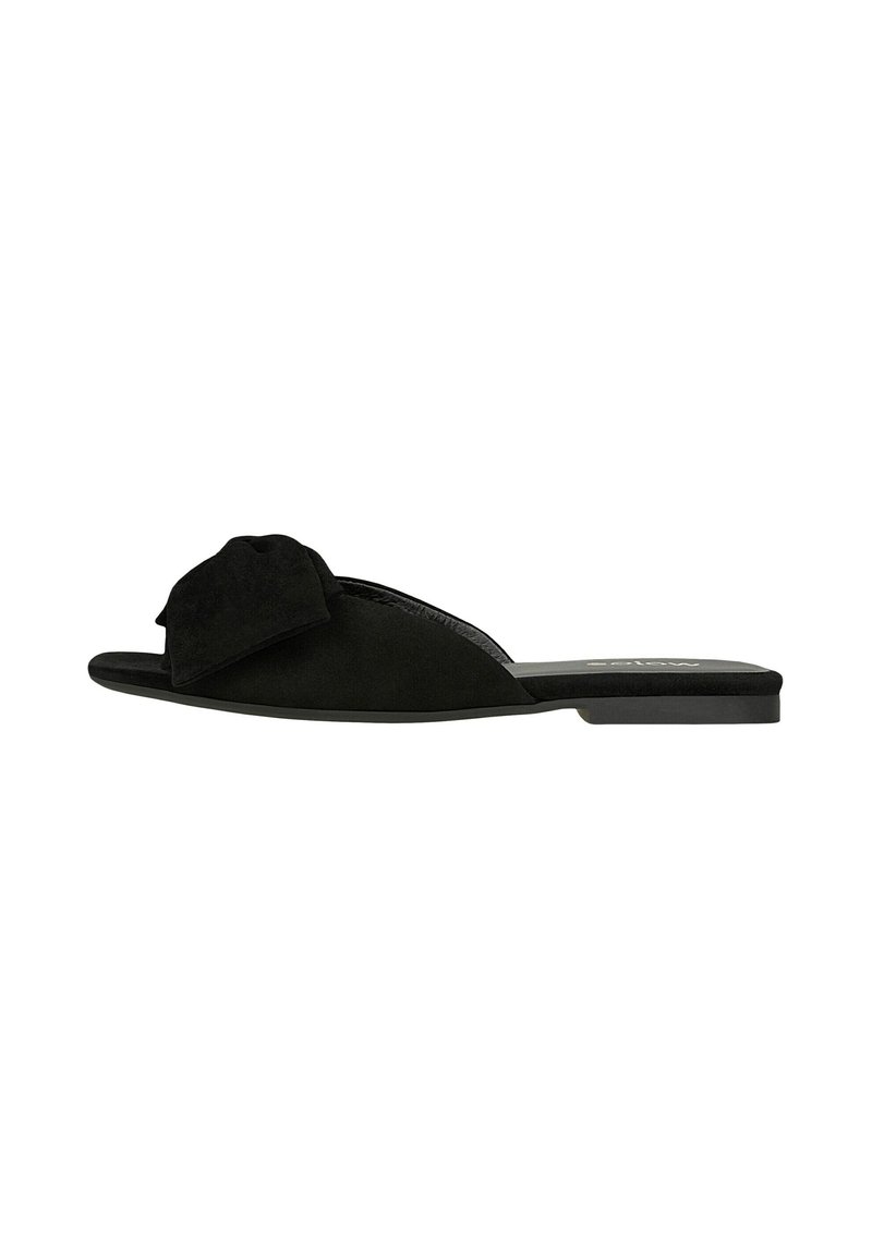 Tongs en suede noir avec un détail en nœud sur le dessus, une semelle plate et un design à bout ouvert. Texture lisse sur l'ensemble.