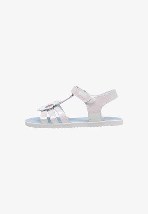 Sandale blanche pour filles avec des brides rose clair, décoration fleurie, fermeture velcro réglable et semelle intérieure bleue rembourrée.