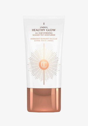 Unisex tinted moisturizer in a white and rose gold tube. Features sunburst design and text for hydration and summer glow benefits.