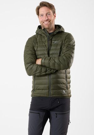 Olive green puffer jacket with a hood, featuring a zip closure, elastic cuffs, and subtle branding on the chest. Smooth, insulated texture.