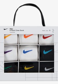 Σετ 9 ζευγών κάλτσων Nike σε λευκό, μαύρο και γκρι, με πολύχρωμες λεπτομέρειες του λογαριασμού σε πορτοκαλί, μωβ, μπλε, πράσινο και κίτρινο.