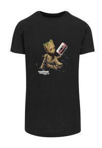 Black cotton t-shirt featuring a graphic of a character resembling a tree holding a cassette tape. Text includes "Guardians of the Galaxy Vol. 2."