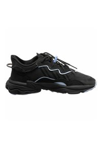 Black athletic shoes with a textured mesh upper, reflective blue accents, sturdy rubber sole, and prominent lacing system.