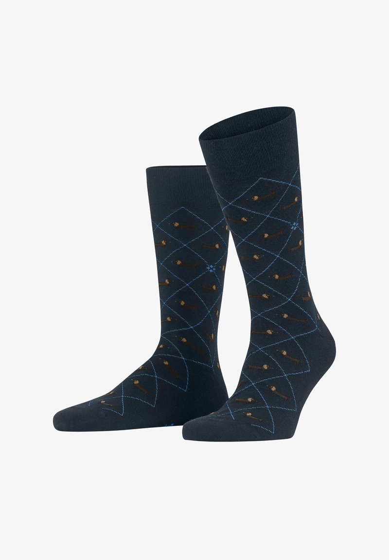 Granatowe skarpetki z wzorem w diamenty i jasnymi niebieskimi liniami. Zawierają małe wzory jamnika w kolorze brązowym rozmieszczone w równych odstępach. Materiał mieszanki bawełny.