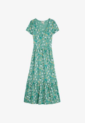 Žalia gėlių suknelė su trumpomis rankovėmis, V formos iškirpte ir raukšlėta daugiasluoksne sijonėle, papuošta baltais gėlėmis ir lapų raštais. Pagaminta iš minkštos medžiagos.