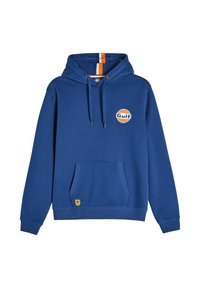 Niebieska bawełniana bluza z kapturem z kieszenią z przodu, regulowanymi sznurkami i okrągłym logo Gulf. Wnętrze kaptura w pomarańczowe i białe paski.