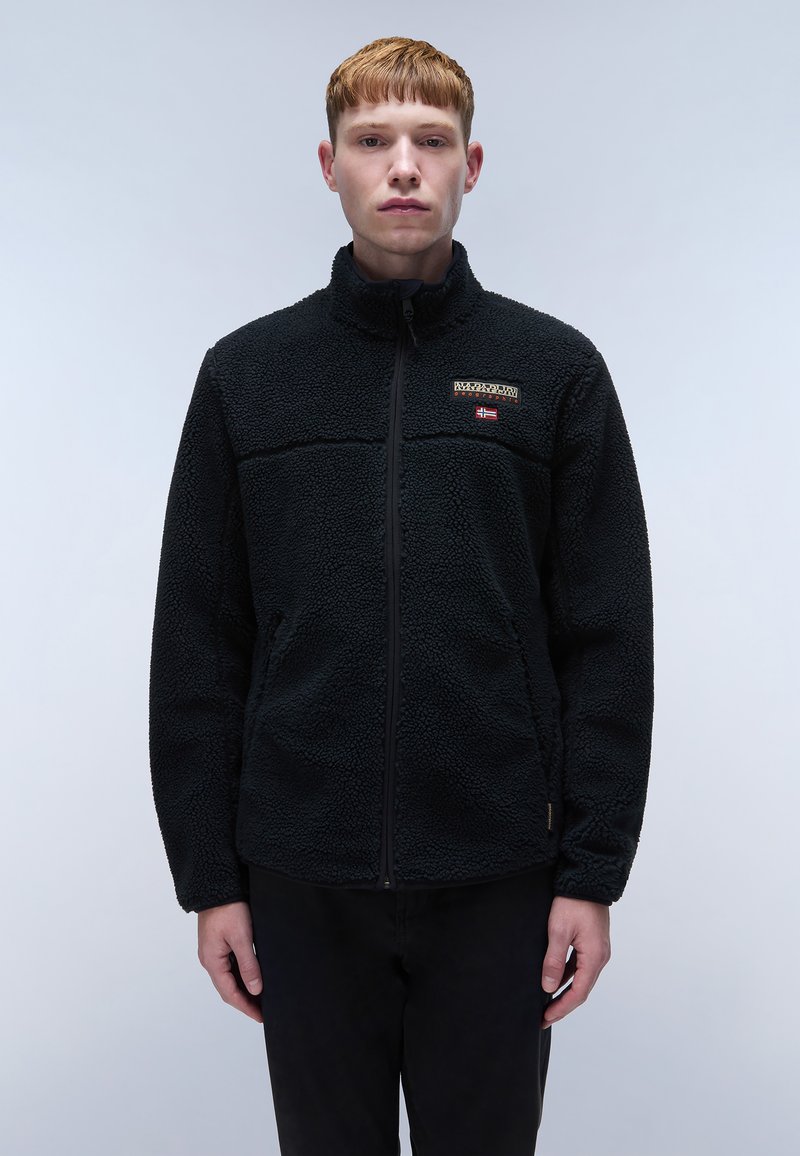 Black fleece jacket with a zip front, textured fabric, high collar, and a small logo on the chest. Features a solid black design.