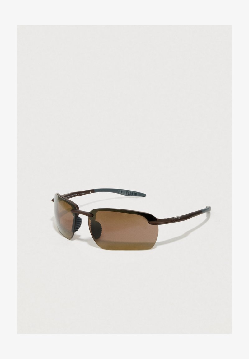 Brown rimless sunglasses with rectangular tinted lenses and curved dark brown temples on a plain light background.