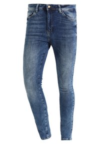 Kapeat farkut vaaleansinisestä denimmateriaalista haalistuneella pesulla, joissa on viisi taskua, vyölenkit ja etupainike.