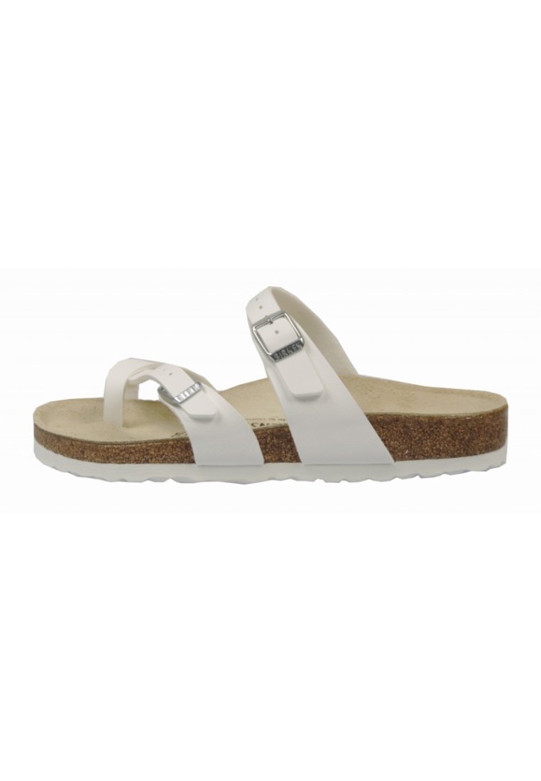 Sandal bianco con due cinghie regolabili e fibbie argentate, un morbido plantare in sughero e una suola in gomma testurizzata.