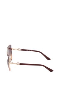Okulary przeciwsłoneczne z brązowymi soczewkami o gradiencie, różowo-złotymi metalowymi elementami oraz ciemnobrązowymi plastikowymi zausznikami zdobionymi okrągłymi detalami.