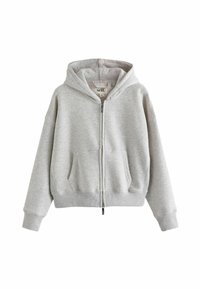 Felpa grigia con zip in materiale morbido, dotata di cappuccio, tasche frontali, polsini e orlo a coste. Design semplice, oversize con minimalismo nel branding.