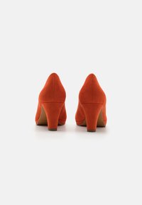 Marco Tozzi Plateaupumps - terracotta