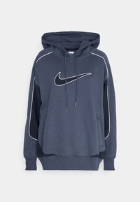 Navy blue hooded sweatshirt with a white Nike logo, contrasting black side panels, drawstrings, and a front pocket. Soft fabric texture.
