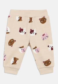 Pantalones de algodón beige con un patrón texturizado que presenta varios rostros de gatos en colores como marrón, rosa y blanco. Cintura elástica.