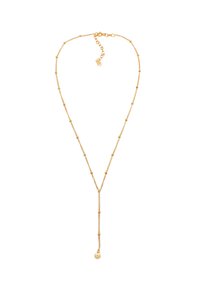 Collier ton or présentant une chaîne délicate avec de petites perles, un design de lasso, et un pendentif lisse unique au bas.