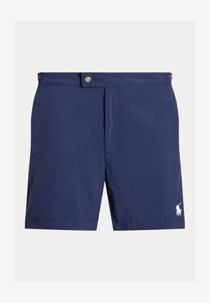 Tengerészkék fürdőnadrág könnyű anyagból, elülső gombos záródással, oldalzsebekkel és egy kis fehér logóval az alsó oldalon.