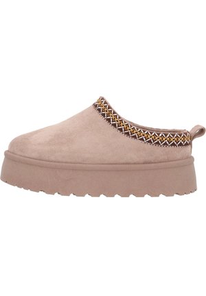 Slip-on shoe in beige suede with a thick, textured sole. Features woven accents in brown and gold along the upper edge.