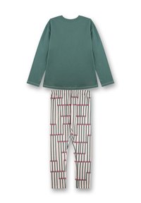 Groene langearm katoen top gecombineerd met crèmekleurige leggings met verticale strepen en roze blokpatronen. Elastische tailleband op de leggings.