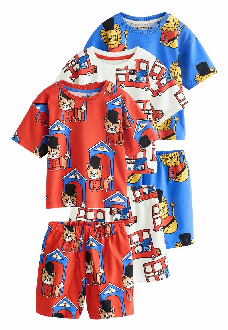 Set med barnpyjamasar i bomullstyg, färgglada tryck av tecknade djur, inklusive lejon och katter, med olika teman.