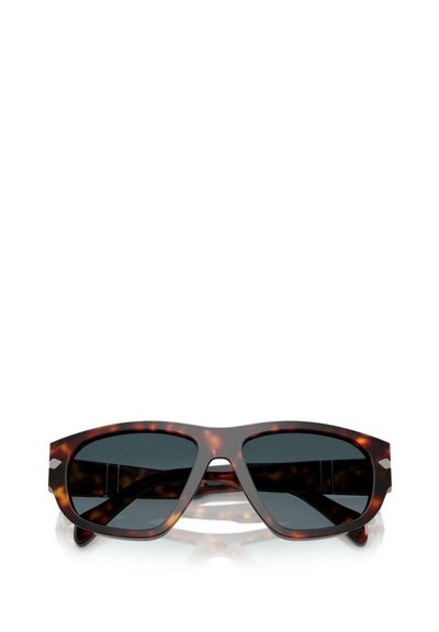 Skildpadde solbriller med mørke linser, har en bred rektangulær stel. Glat overflade og fremtrædende brynlinje.