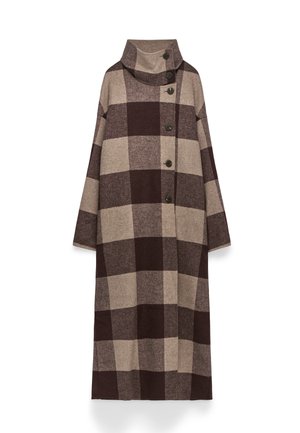 Tunika lunga in misto lana a fantasia check marrone e beige, con colletto alto e cinque bottoni sul davanti. Vestibilità generosa e maniche.