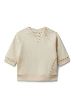 Sweatshirt crème à col rond avec un tissu texturé, des manches raglan et des bord-côtes aux poignets et à l'ourlet. Dispose d'un détail de décolleté en triangle.