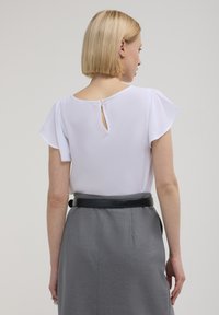 Calliope CON VOLANT - Camicetta - bianco