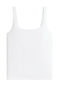Débardeur court blanc sans manches avec larges bretelles et encolure carrée sur un fond uni.
