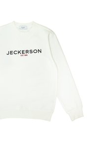 White sweatshirt with a v-neck design. Features black embroidered "JECKERSON" text with "EST. 1995" below in red. Soft, textured fabric.