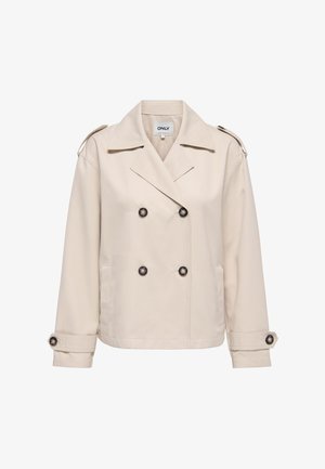 Beżowa dwurzędowa marynarka z szerokimi klapami, pagonami na ramionach, bocznymi kieszeniami i mankietami zapinanymi na guziki.