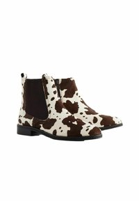 Unselected, new cow print leather