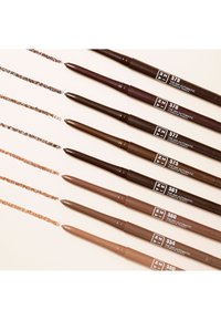 Eight eyebrow pencils arranged horizontally, featuring various shades from dark to light brown, with fine tips and labels.