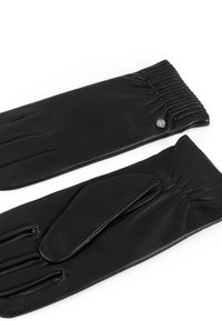 Un paio di guanti in pelle nera con dettaglio di polso elasticizzato arricciato e un piccolo logo metallico su un guanto, disposti piatti su sfondo bianco.
