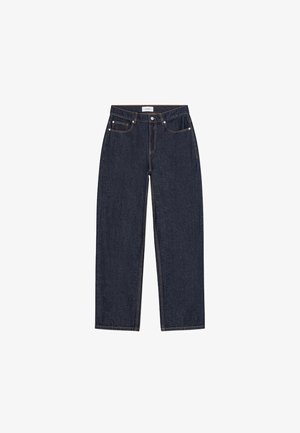 Tumesinised sirgelõikelised teksapüksid kõrge vöökohaga, ees taskud ja kontrastsed õmblused. Memaks trikotaaži jälgi.