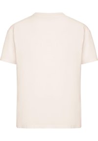 Camiseta de manga corta y cuello redondo en suave algodón beige claro. Diseño sencillo sin patrones ni acentos, con dobladillo recto.