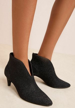 Tronchetti - black