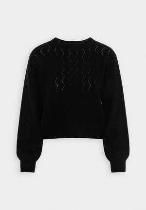 Stickad tröja - black