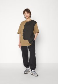 Jordan PANT - Pantalones deportivos - black