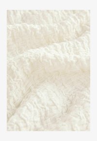 Wybrany, white