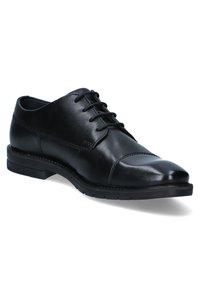 Zwarte leren dress shoe met ronde neus, vetersluiting en subtiele stiksels. Rubberen zool met lichte profiel voor grip.