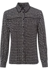 Chemise boutonnée à manches longues en tissu lisse, à col, avec un motif géométrique subtil en noir et blanc.